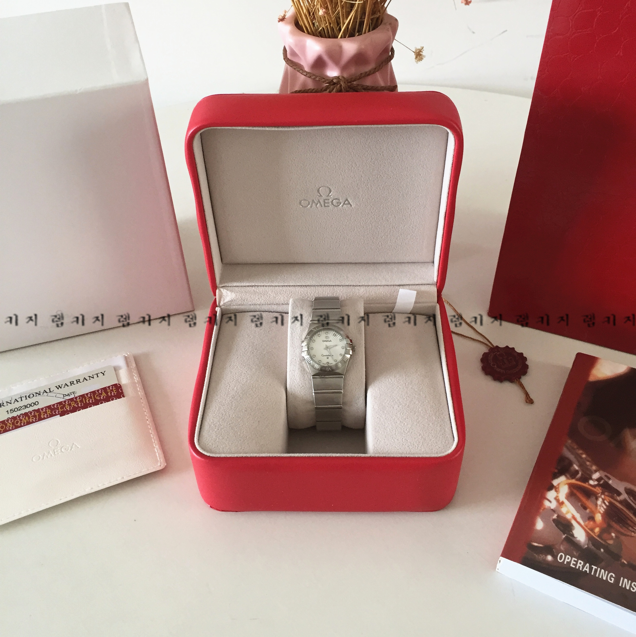 오메가 컨스틸레이션 은장 메탈시계 여성용